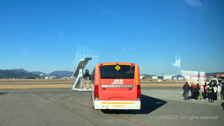 images of people travelling aboard an airliner